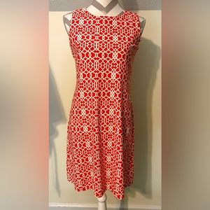Sleeveless dress by June Connally. Nylon silky material.